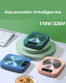 Aquecedor de Caneca de 3 cores sob mesa com rosquinha