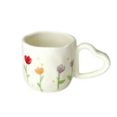 caneca encantadora, feita de porcelana cerâmica, destaca-se pelo design único e romântico da alça em forma de coração, pintada à mão