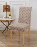 Capa para Cadeira em Jacquard em cadeira marrom perto de mesa