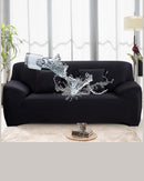 Capa de Sofá Impermeável preta de frente jogando água