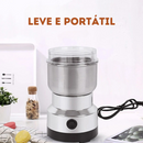 Moedor Elétrico com diferentes utilidades sob mesa com planta
