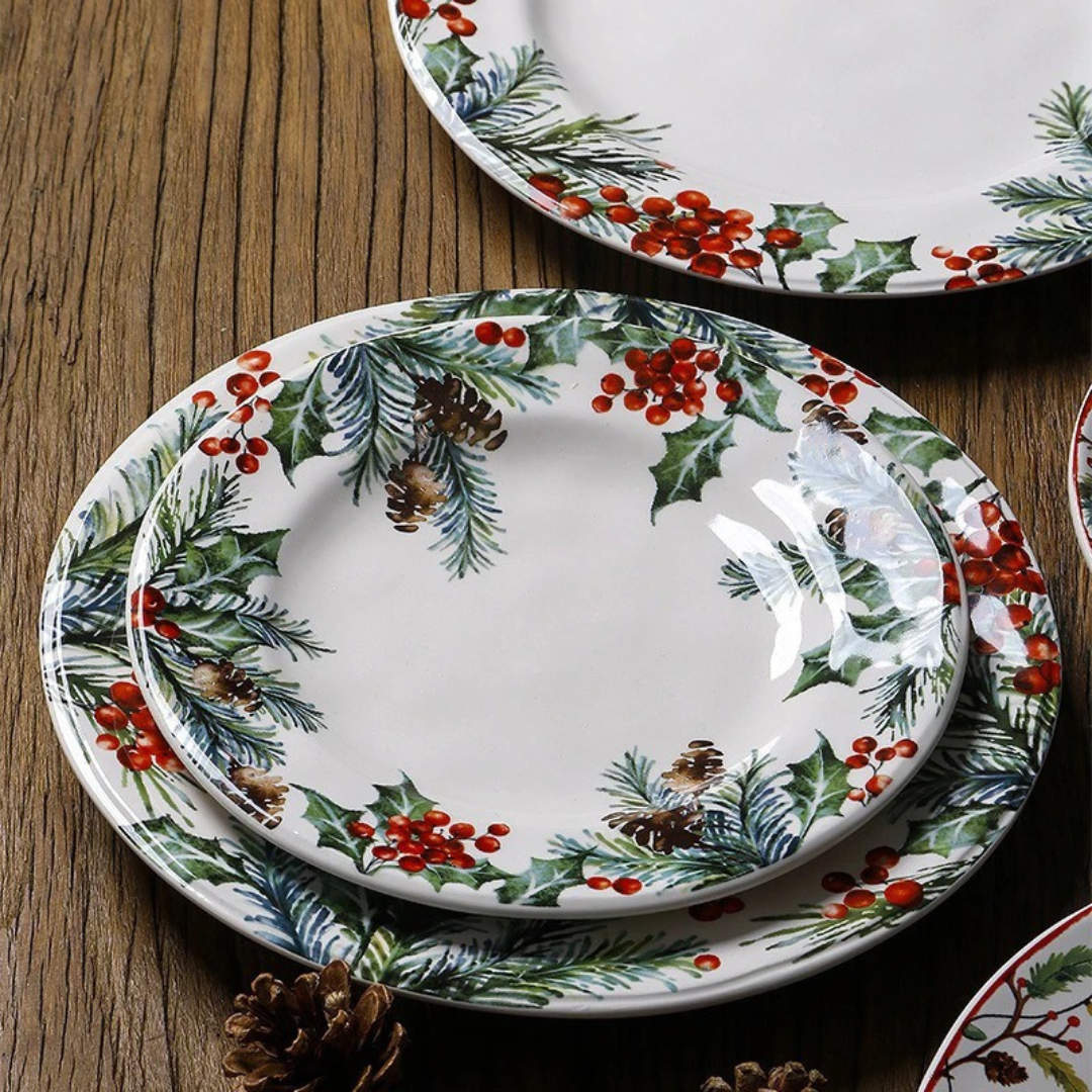 Prato de Natal para Jantar sob a mesa com pinha perto
