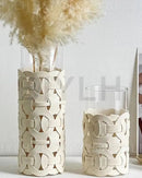 vaso de vidro com planta dentro