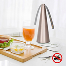Ventilador de mesa sob mesa com suco e lanche